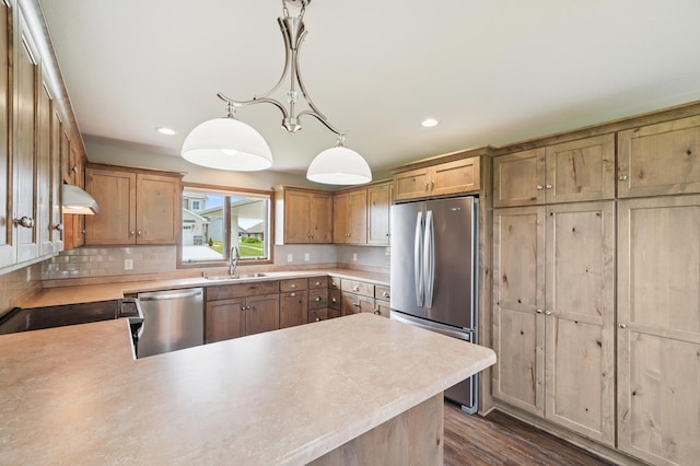 1516 Ranger Dr, Glencoe, MN 55336 - kitchen with stainless steel appliances, light countertops, under cabinet range hood, and recessed lighting