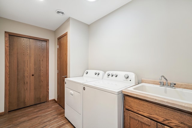1516 Ranger Dr, Glencoe, MN 55336 - laundry area featuring independent washer and dryer and light wood-type flooring
