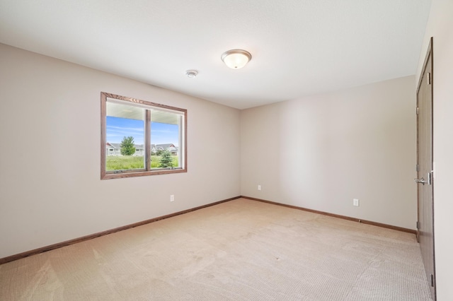 1516 Ranger Dr, Glencoe, MN 55336 - empty room with light carpet and a smoke detector