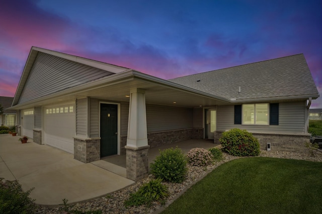 1516 Ranger Dr, Glencoe, MN 55336 - view of front of home with concrete driveway, an attached garage, brick siding, a shingled roof, and a front yard