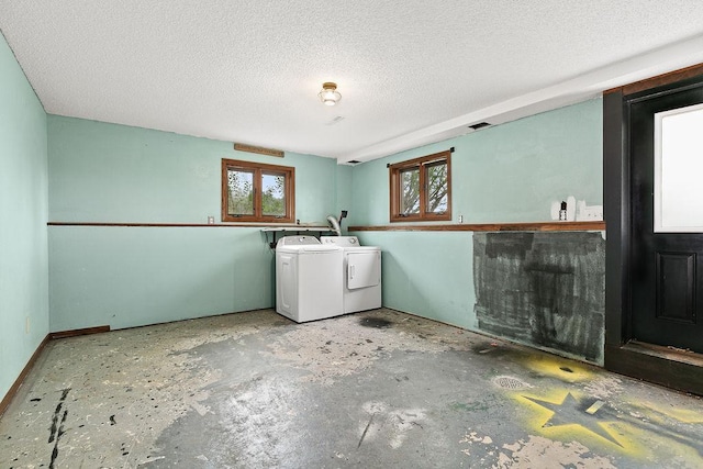 19867 Twin Lakes Rd, Darling Twp, MN 56345 - laundry room with separate washer and dryer, a textured ceiling, and bar