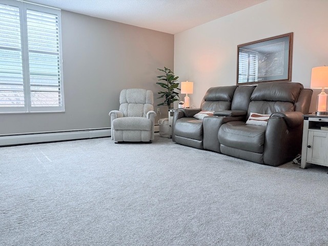 6615 Lake Shore Dr S Unit 415, Richfield, MN 55423 - carpeted living room with a baseboard radiator, plenty of natural light, and a baseboard heating unit