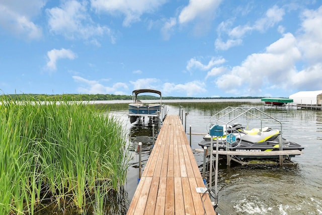 21048 Eagle Dr, Leslie Twp, MN 56360 - dock area featuring a water view