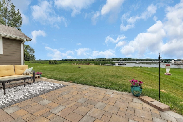 21048 Eagle Dr, Leslie Twp, MN 56360 - view of patio featuring a water view