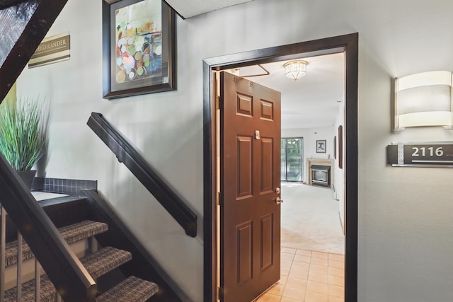 7625 Edinborough Way Unit 2116, Edina, MN 55435 - stairway featuring carpet flooring and tile patterned floors