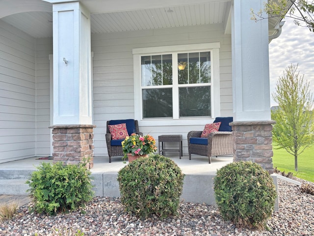 doorway to property featuring covered porch