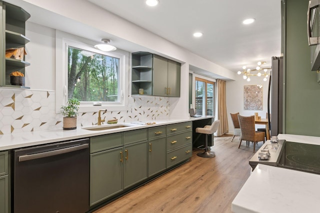 1795 Nolan Ave N, West Lakeland Twp, MN 55082 - kitchen with stainless steel appliances, green cabinets, open shelves, a sink, and healthy amount of natural light