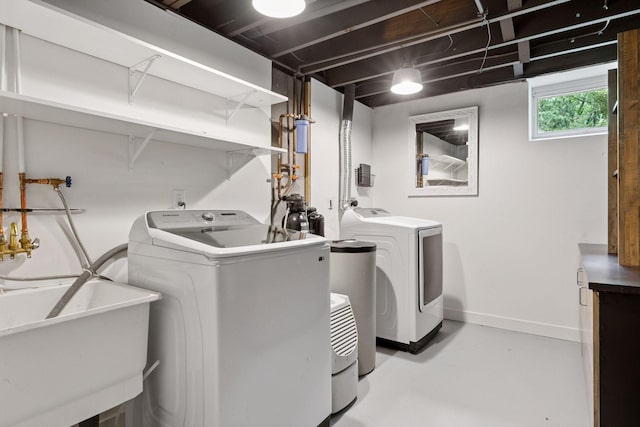 1795 Nolan Ave N, West Lakeland Twp, MN 55082 - laundry room with washer and dryer and baseboards