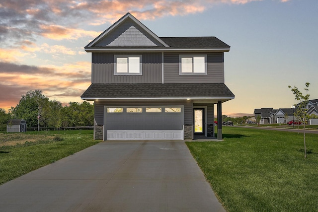 1129 Tiger Ct NE, Isanti, MN 55040 - view of front of home featuring a front lawn, a garage, stone siding, roof with shingles, and board and batten siding
