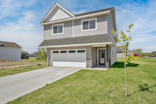 1129 Tiger Ct NE, Isanti, MN 55040 - view of front of home featuring a garage, a front lawn, a shingled roof, concrete driveway, and board and batten siding