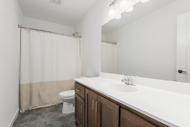 1129 Tiger Ct NE, Isanti, MN 55040 - bathroom featuring vanity, toilet, and a shower with shower curtain
