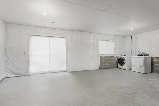 1129 Tiger Ct NE, Isanti, MN 55040 - below grade area featuring separate washer and dryer