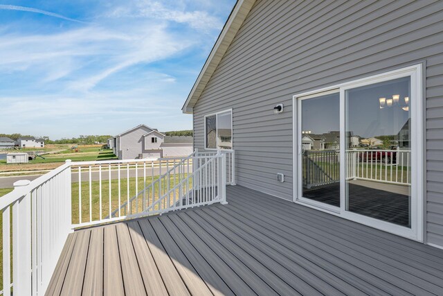 1129 Tiger Ct NE, Isanti, MN 55040 - deck featuring a yard
