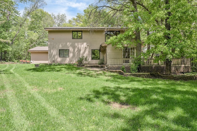 13640 Alamo St NE, Ham Lake, MN 55304 - back of property with a deck and a lawn