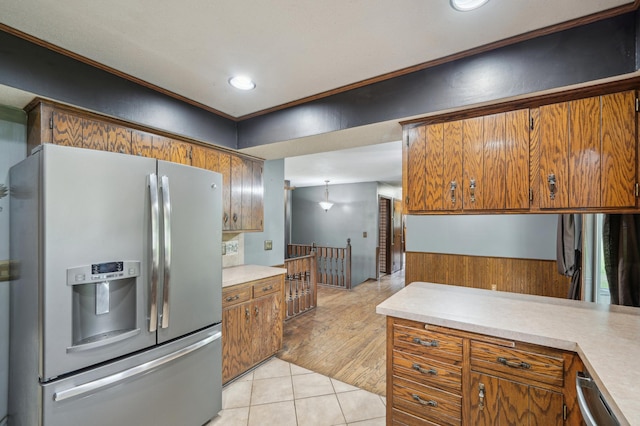 22800 401st Ave, Arlington Twp, MN 55307 - kitchen with stainless steel appliances, light countertops, brown cabinets, light tile patterned floors, and recessed lighting