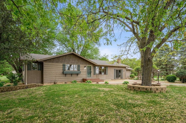 22800 401st Ave, Arlington Twp, MN 55307 - rear view of property featuring a chimney and a lawn