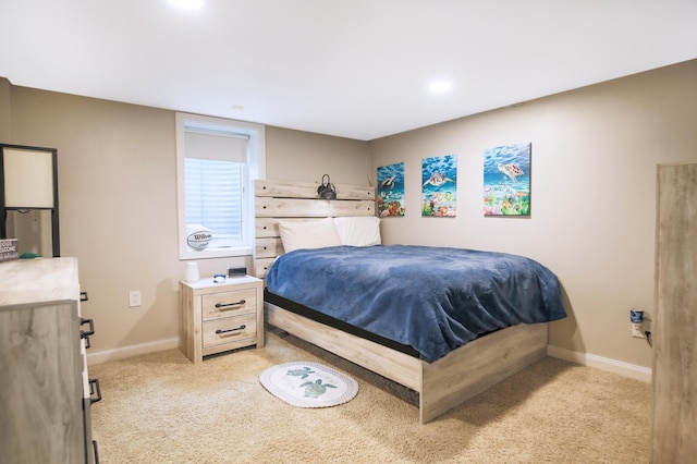 726 17th St NE, Owatonna, MN 55060 - bedroom with light carpet and baseboards