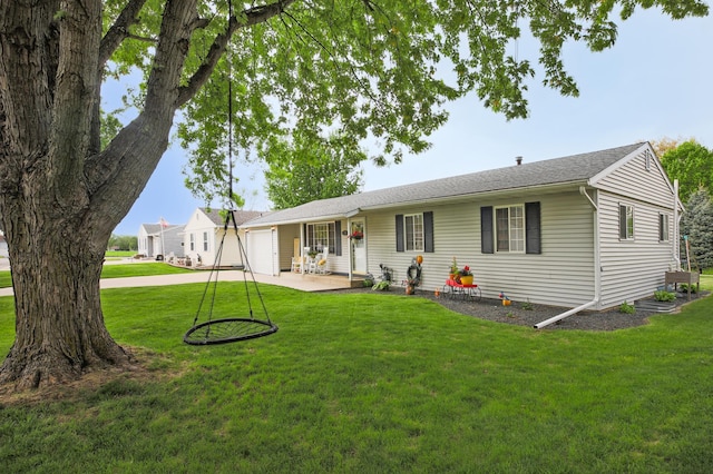726 17th St NE, Owatonna, MN 55060 - view of front of house with an attached garage, a front lawn, and driveway