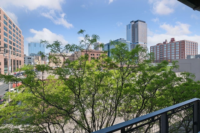balcony featuring a view of city