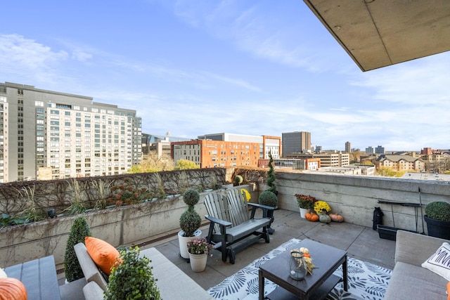 view of patio / terrace featuring a city view