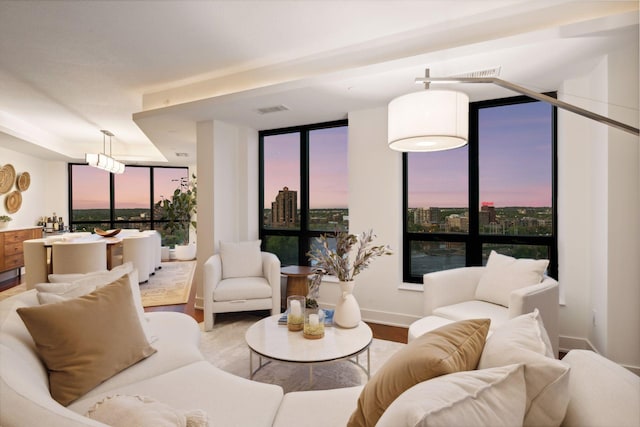living room with wood finished floors and baseboards