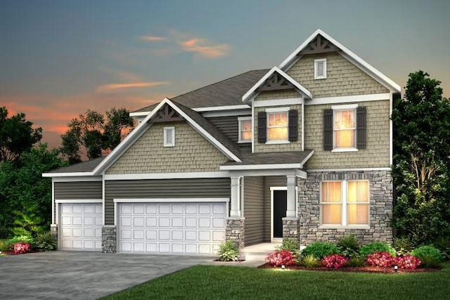 craftsman inspired home featuring stone siding, driveway, and a garage