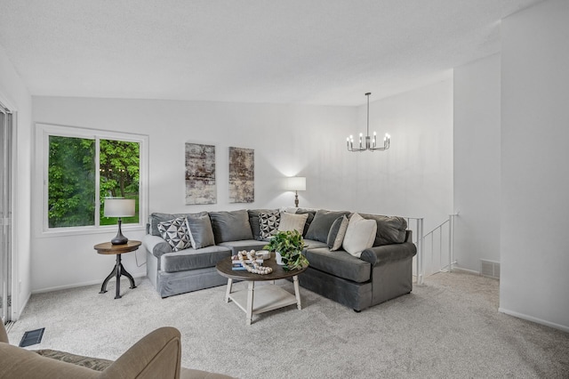 135 Eagle Lake Dr, Maple Grove, MN 55369 - living room featuring carpet, a chandelier, baseboards, and vaulted ceiling