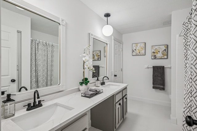 135 Eagle Lake Dr, Maple Grove, MN 55369 - full bathroom featuring double vanity, toilet, a textured ceiling, and a shower with curtain