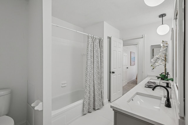 135 Eagle Lake Dr, Maple Grove, MN 55369 - bathroom featuring toilet, double vanity, shower / bath combo, and tile patterned floors