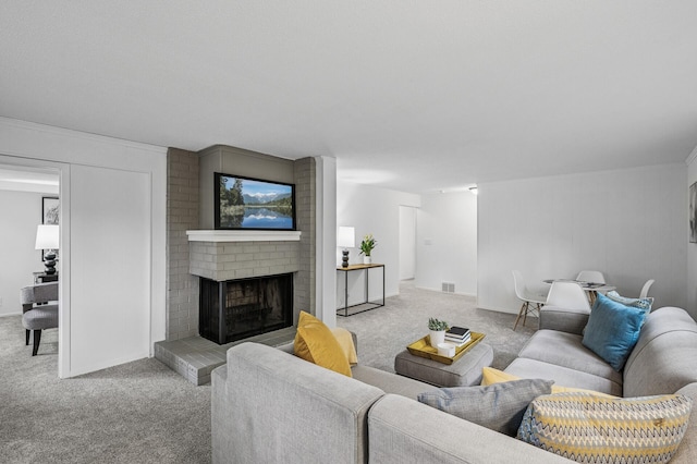 135 Eagle Lake Dr, Maple Grove, MN 55369 - carpeted living area featuring a fireplace