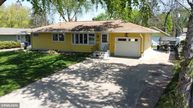 2828 Matilda St, Roseville, MN 55113 - single story home featuring driveway, an attached garage, a front yard, and a chimney