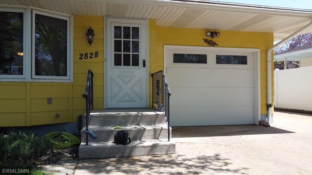 2828 Matilda St, Roseville, MN 55113 - entrance to property with concrete driveway and a garage