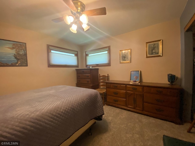 2828 Matilda St, Roseville, MN 55113 - carpeted bedroom with a ceiling fan
