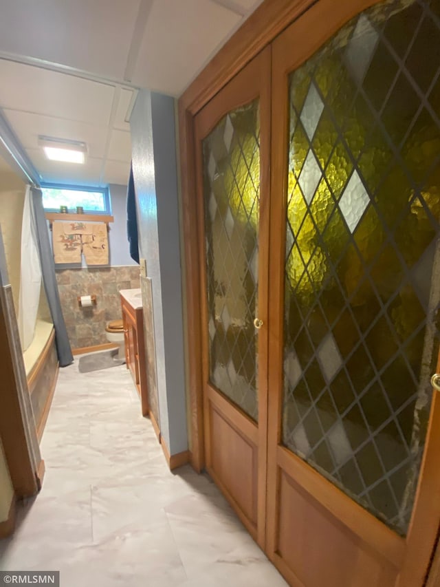 2828 Matilda St, Roseville, MN 55113 - doorway featuring baseboards