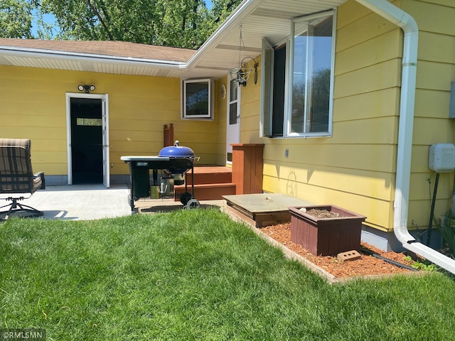 2828 Matilda St, Roseville, MN 55113 - rear view of house featuring a yard, a shingled roof, and a patio