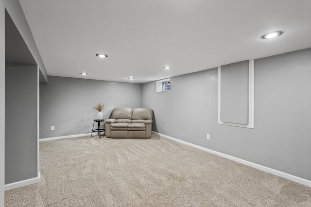 living area featuring recessed lighting, carpet floors, and baseboards
