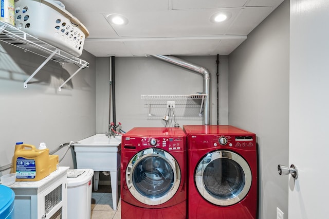 clothes washing area with washer and dryer and recessed lighting