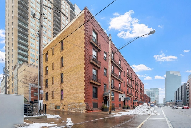 view of building exterior featuring a city view