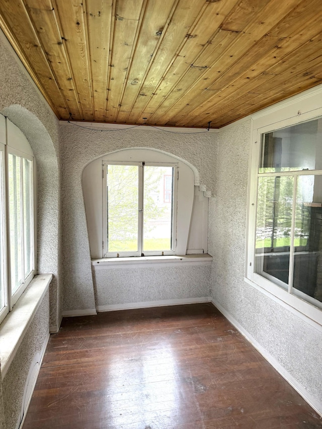 455 3rd St SE, Cokato, MN 55321 - unfurnished sunroom with plenty of natural light, arched walkways, and french doors