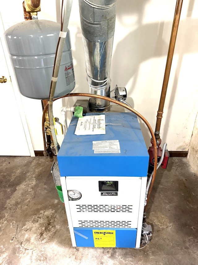 455 3rd St SE, Cokato, MN 55321 - utility room with a heating unit