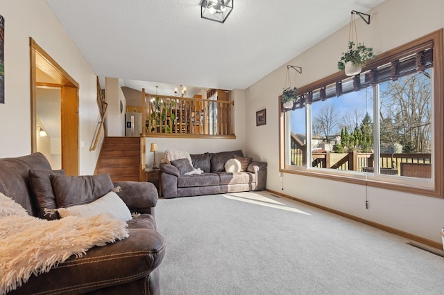 1284 Otter Ridge Rd, White Bear Twp, MN 55110 - carpeted living area with stairs, baseboards, and lofted ceiling