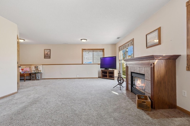 1284 Otter Ridge Rd, White Bear Twp, MN 55110 - carpeted living room with baseboards and a tile fireplace