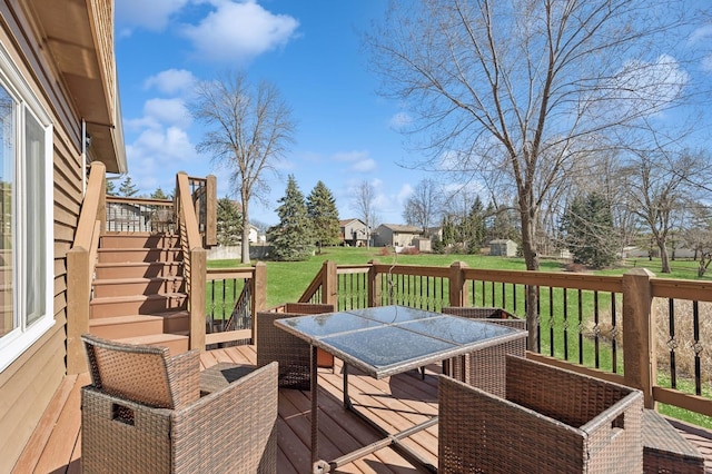 1284 Otter Ridge Rd, White Bear Twp, MN 55110 - wooden terrace with outdoor dining area, stairway, a yard, and a residential view