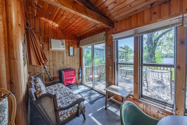 sunroom with healthy amount of natural light and an AC wall unit