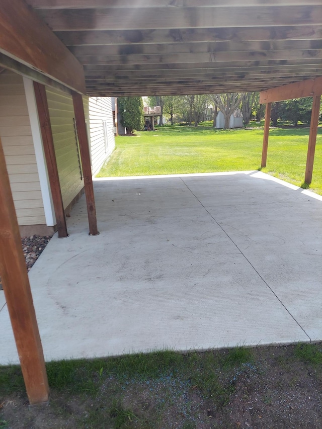 view of patio with an attached carport