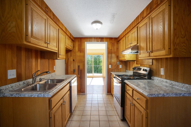 kitchen with stainless steel electric range oven, under cabinet range hood, a sink, dishwasher, and wood walls