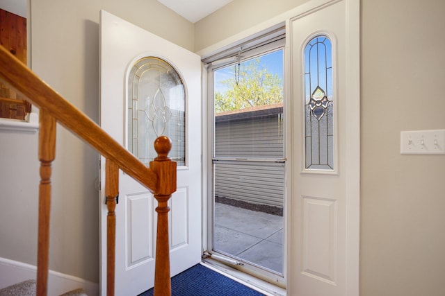 foyer featuring stairway