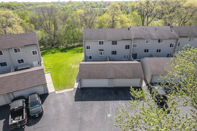 drone / aerial view of a heavily wooded area