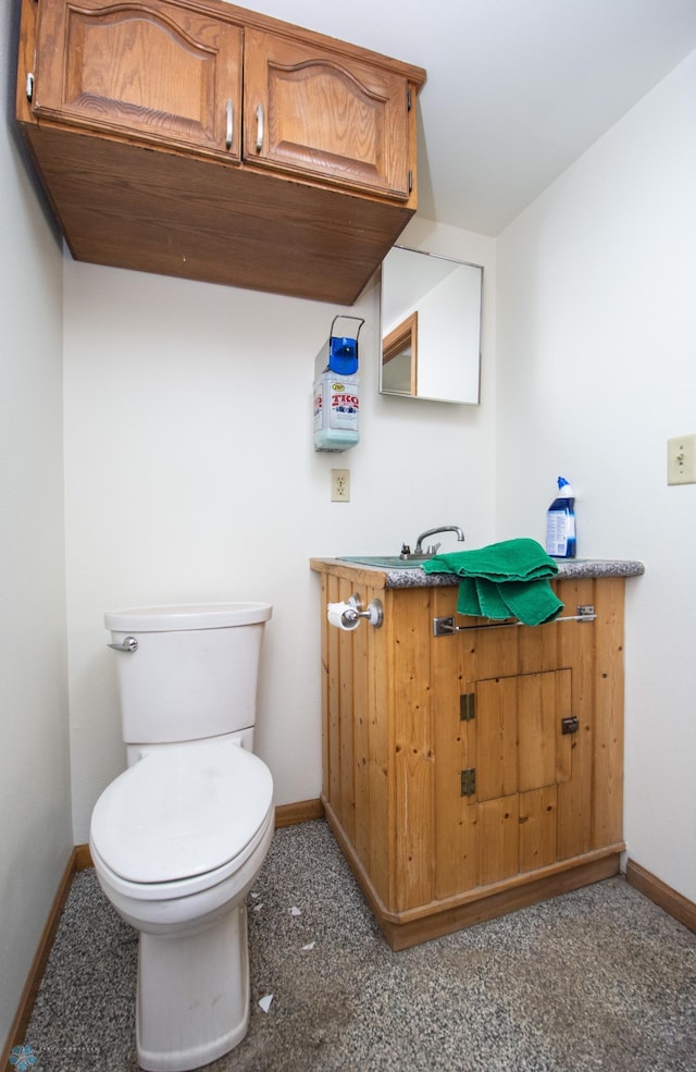 6673 230th St N, Cromwell Twp, MN 56549 - bathroom with baseboards and toilet