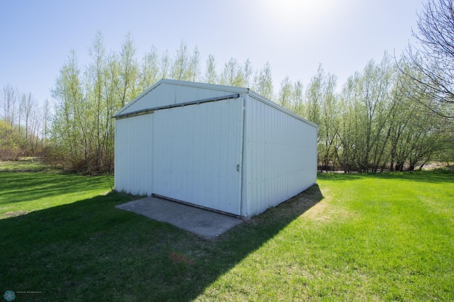 6673 230th St N, Cromwell Twp, MN 56549 - view of pole building featuring a lawn